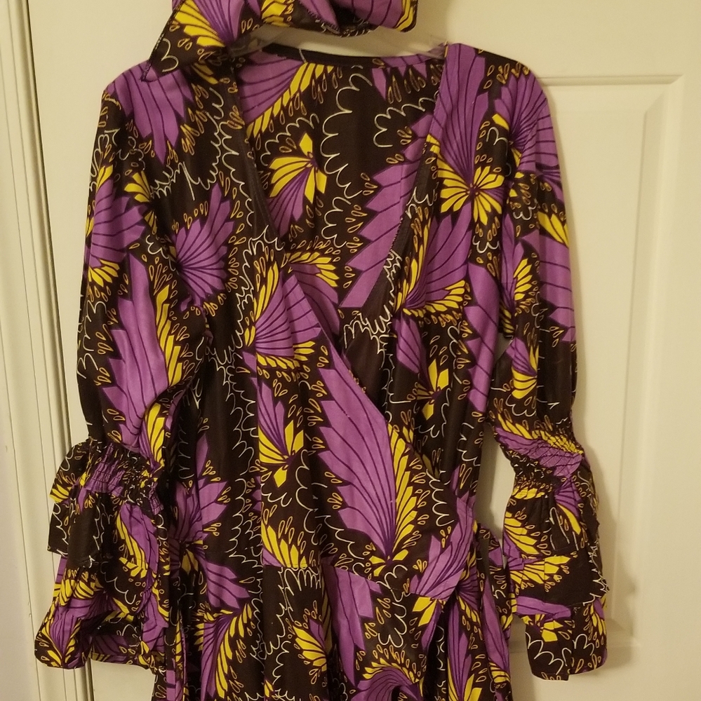 African print wrap dress.  Fits waist 32-38".